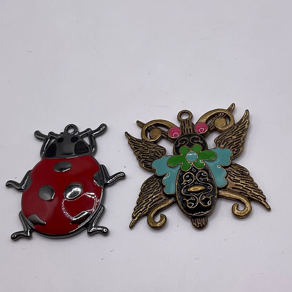 NWOT Red Ladybug and Gold Butterfly charm Set